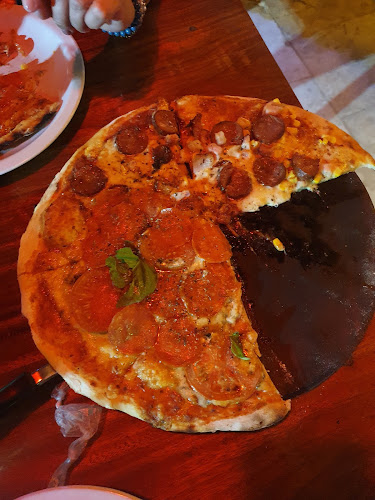 Lá Nostra Pizzaria e restaurante - Gastronomia e hotelaria