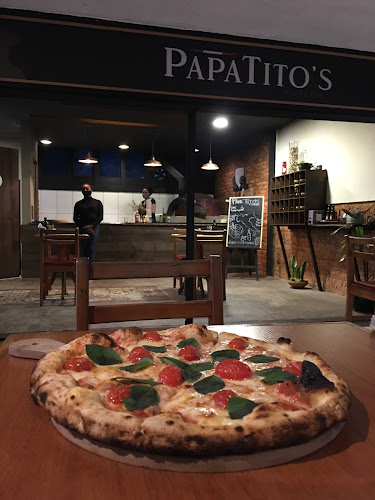 Papa Tito's Pizzeria - Gastronomia e hotelaria